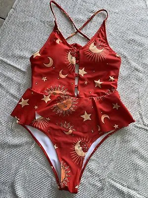 One Piece Swimming Suit Size Large Red Sun Moon Stars Print • $6.99
