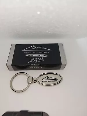 Michael Schumacher Memrobiola Key Ring + 2 Pin Badges -red Helmet oval Badge • $5.60