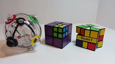 Lot Of 3 Twisty Puzzles: Meffert's Pocket Cube Square- 1 And Rubik's 360 EUC! • $18.40