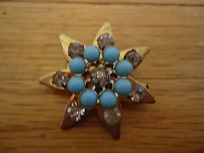 Vintage 7 Pointed Star Turquoise Faux Rhinestone Brooch Pin Gold Colored • $9.99