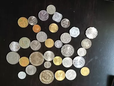 34 Asian Coins: 1969 $1 Malaysia 1964 Viet Nam 10 Dong  • $17