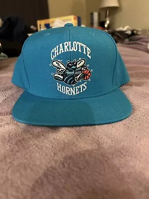 Blue Charlotte Hornets Mitchell & Ness Snapback Hat • $15