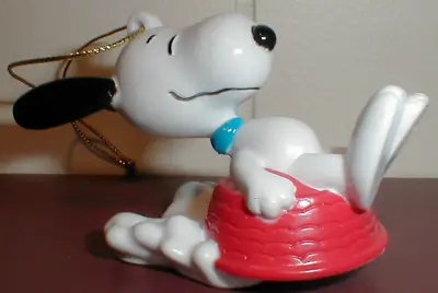 Snoopy Peanuts Christmas PVC Ornament Sledding Dog Dish Whitman's Decoration • $11.99