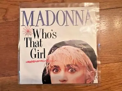 Madonna	Who’s That Girl / White Heat 7  Vinyl Single On Sire W8341 928 341-7 • £5