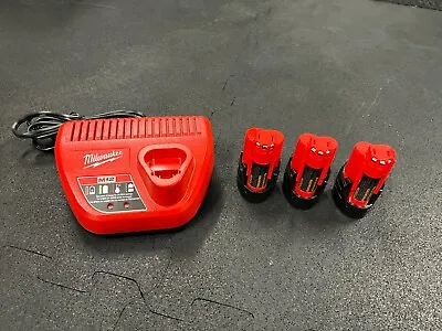 Milwaukee M12 Charger (48-59-2401) & Three M12 1.5Ah Batteries (48-11-2401) • $61.99