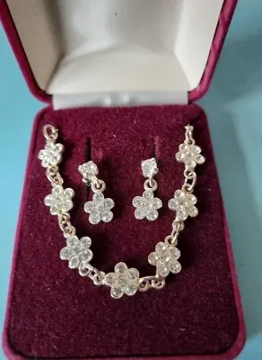 Silver Coloured Daisy Necklace And Earrings Set.                H. SAMUEL  • £14.99
