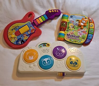 Mixed Lot Of Baby/Toddler Musical Toys Instruments Wiggles Guitar VTech Book  • $39.99