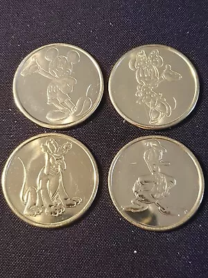 4 Disneyland Medallions 119-122 Mickey Mouse Minnie Mouse Donald Duck Pluto • $34