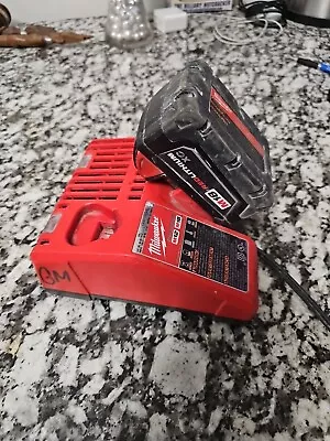 Milwaukee Dual Charger And 3 Amp Battery • $75