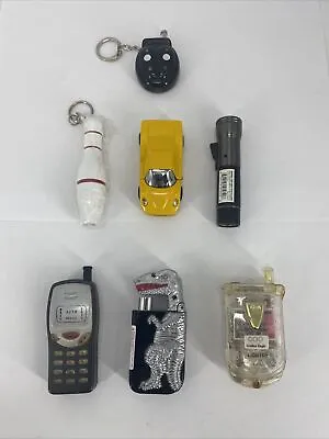 LOT OF 7 Vintage Refillable Butane Lighters Car Bug Phone Dinosaur Bowling Pin • $24.09