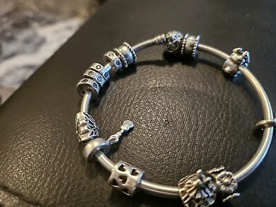 Pandora Bracelet With 5 Charms 19cm  • £60