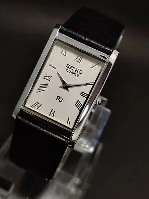 Seiko Slim Quartz WHITE FACE New Battery Japanese Men's Wrist Watch SQ87 • £18.85