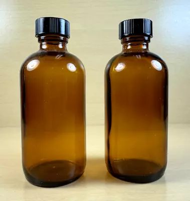 Two (2) 4 Oz Amber Glass Bottles W/ Black Lids - #10 • $2.99