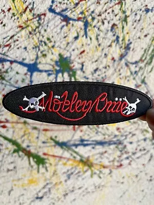 Motley Crue Iron On Patch Black Oval Skulls  Red Lettering • $5.99