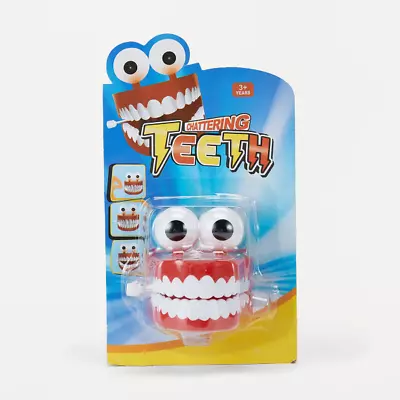 Jumping Wind Up Teeth Chattering Smile Clockwork Beating Denture Mechanical Toy • $5.98