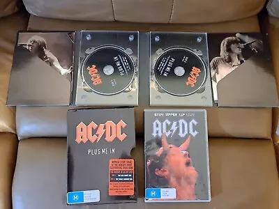 DVDs AC/DC Plug Me In & Stiff Upper Lip Live On 3 Discs • $10