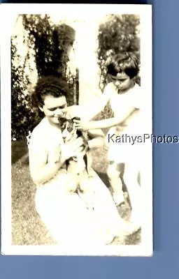 Found Vintage Photo D_7192 Woman In Dress Kneeling Holding Dog By Boy • $6.98
