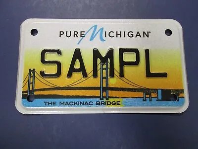 Michigan Motorcycle Sample License Plate Tag # SAMPL. The Mackinac Bridge. Mint. • $19