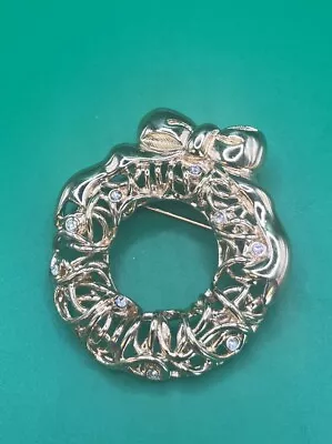 Monet Wreath Brooch Pin Gold Tone Clear Rhinestone Christmas Open Work Bow • $17.99