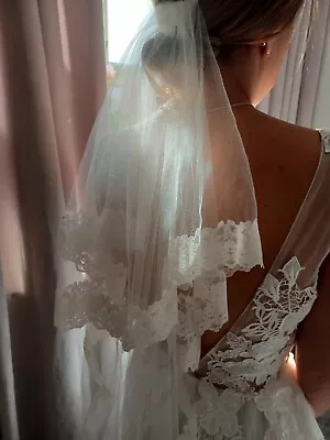 Ivory Two Tier Fingertip Length Veil Edged With Lace • £30