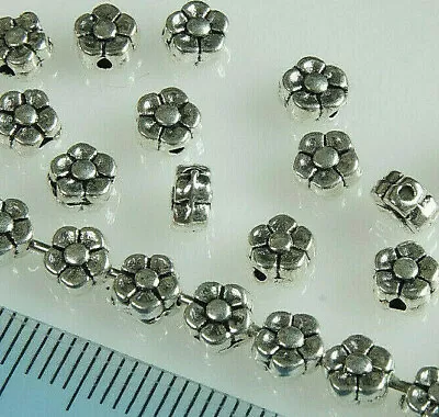 100 X ANTIQUE SILVER~ROUND~FLOWER~TIBETAN STYLE~METAL~SPACER BEADS 5 X 3 MM • £1.89