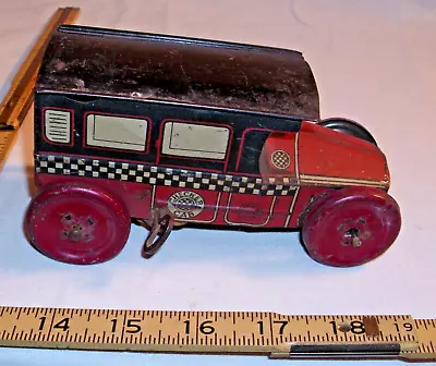 J CHEIN 1920s CHECKER CAB CAR TIN WIND UP TOY • $74.99