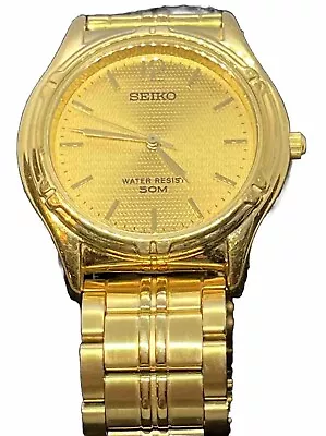 Seiko Stainless Steel Gold Tone Mens Watch Working. 50M Movement Japan V701-2210 • $9.97