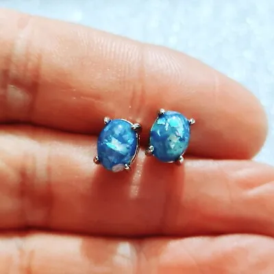 925 Silver 7mmx5mm Blue Firefox Opal Earrings • £7.99