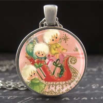 Vintage Kitschy Christmas Little White Haired Angels Sleigh Necklace Art Pendant • $25