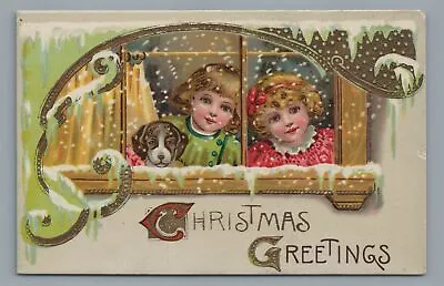 CHRISTMAS Greetings Children In Window Puppy Dog Vintage Postcard • $4.99