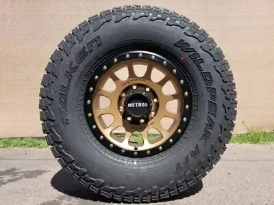 17x8.5 METHOD MR305 BRONZE WHEELS RIMS 2657017 AT4W TIRES TACOMA FJ LAND CRUISER • $2499