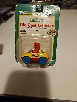 Matchbox Tyco Sesame Street Elmo Taxi Diecast 1996 Factory Sealed Model • $15.99