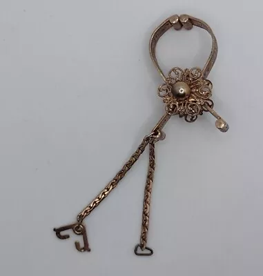 Vintage Glove Clip Holder Goldtone Metal Etched Victorian Style Open Work Flower • $13.95