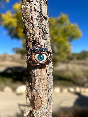  Medusa Evil Eye Pendant.  Wrapped With Copper Wire During Oct14th Eclipse  • $10