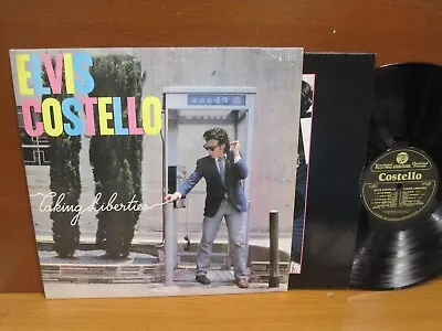 LP / Elvis Costello / Taking Liberties / 1980 1st Issue / Promo-Stamped Cover • $12.95