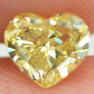 $745 • Buy Loose Heart Shape Diamond Fancy Yellow Color 0.70 Carat Natural Enhanced SI1