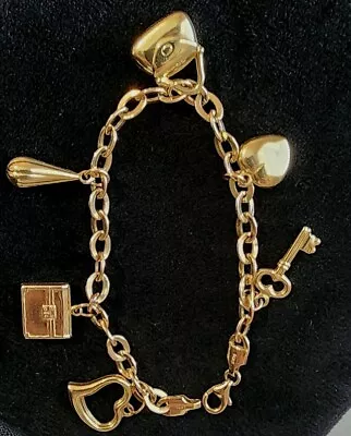 Vintage 14k Gold Charm Bracelet With Charms • $1750