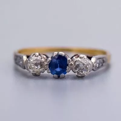 Solid 18K Gold Sapphire Ring With Diamonds Either Side • £150