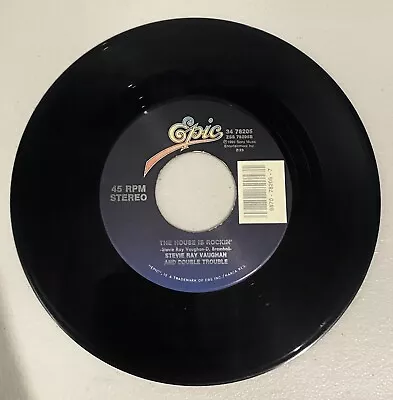 Stevie Ray Vaughan “ The House Is Rockin / Taxman”45 Vinyl Record • $15