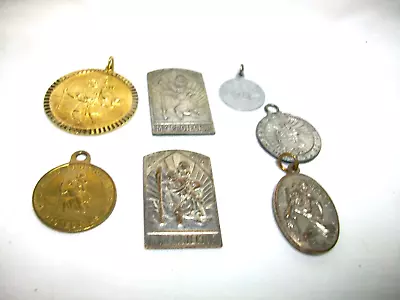 7 Vintage St. Christopher Medals • $12