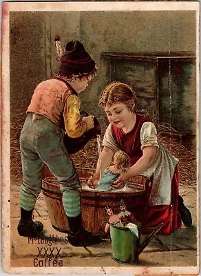 AN-176 McLaughlin's Coffee Victorian Trade Card Children Washing Baby Dolls • $12.50