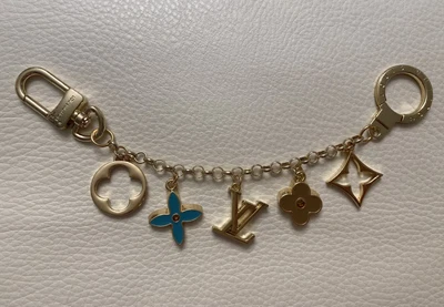 $255 • Buy Louis Vuitton Keychains Bag Charm Floral Blue And Beige In Gold Tone