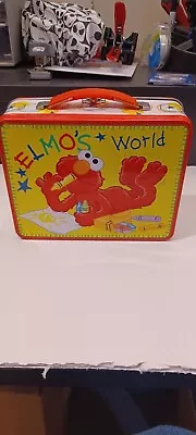 The TIN BOX COMPANY Sesame Street ELMO’S WORLD Tin Metal Lunch Box 2010 • $15