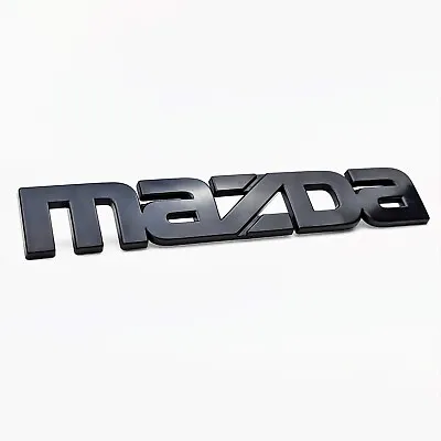 Mazda 1984-1985 RX-7 Black Emblem F023-51-770A OEM Genuine • $51.29