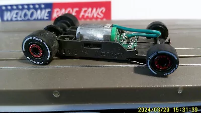 Afx Racing H.o. Scale Mega G+ 1.7 Narrow Chassis With F-zero Alpha Romeo Tires • $22.99