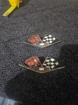  NOS 2- Chevrolet V8 Emblems OEM Nova Impala Chevelle Corvette Cross Flags  • $60