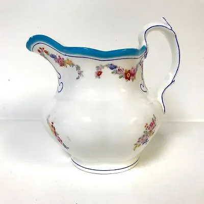 Beautiful Minton English Milk Water Pitcher With Blue Rim And Flower Deocoration • $20