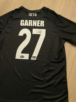$90 • Buy Port Adelaide Player Issue And Worn Joel Garner Signed And Worn Run Out Tee
