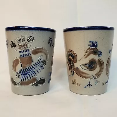 2 German Stoneware Water Glass CLOWN PLAYING ACCORDIAN & CHICKEN ROOSTER  • $39