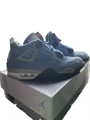 University Blue Jordan 4 • $370